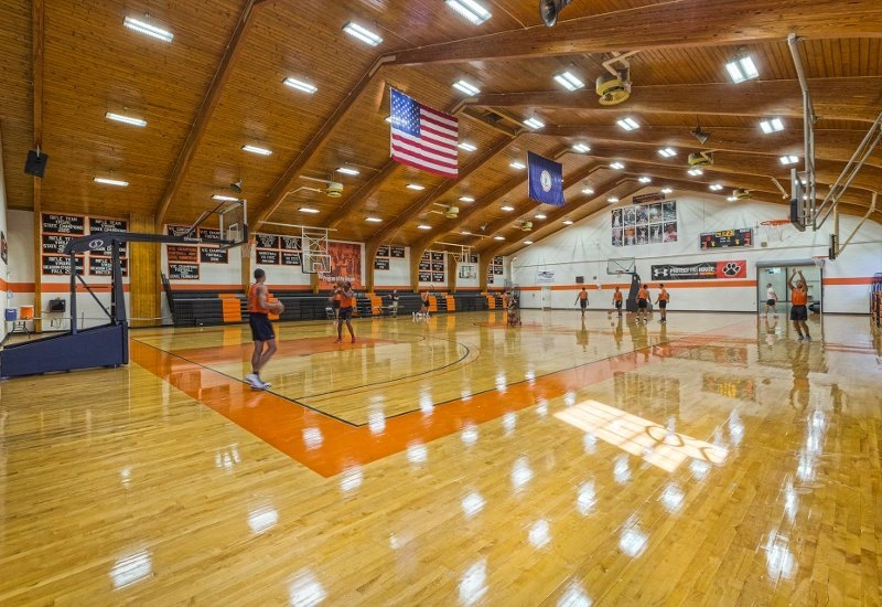 Walter Davis Gym court with orange key and American flag